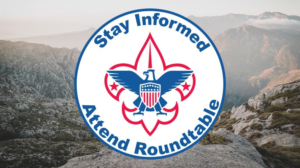 Roundtable Graphic on top of mountain trail.